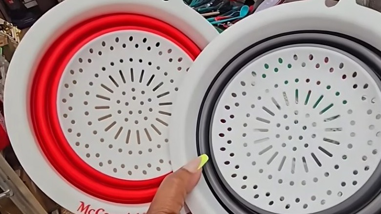Dollar Tree colanders being held in a hand