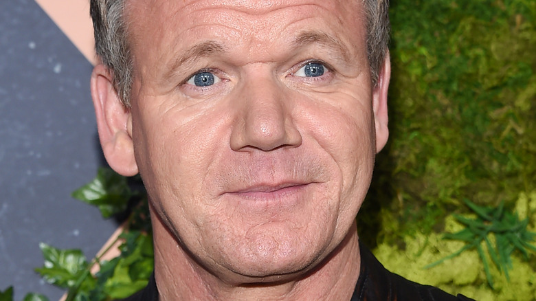 Gordon Ramsay looking to the side with slight smirk