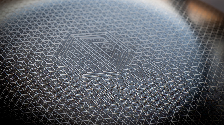 Selective focus on the textured surface of a Hexclad non-stick cooking pan.