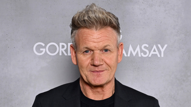 Gordon Ramsay on red carpet at event.