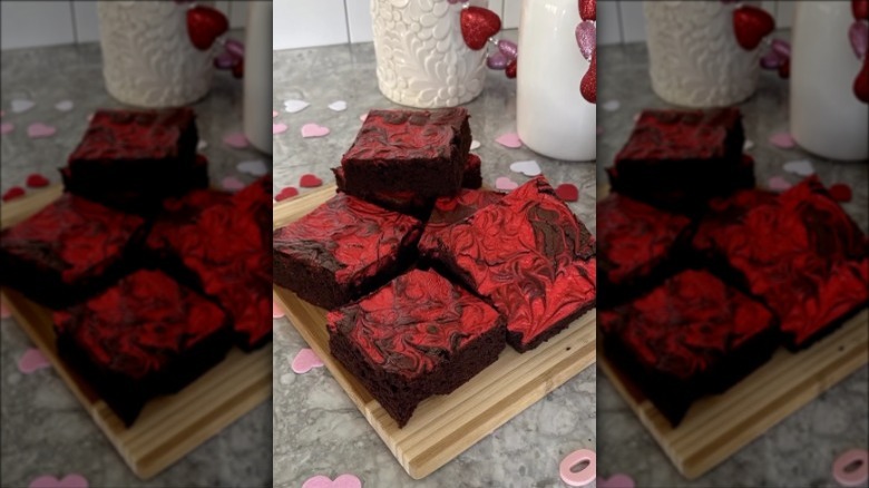 Red velvet brownies on a brown board