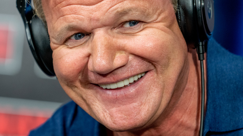 Gordon Ramsay wearing headphones