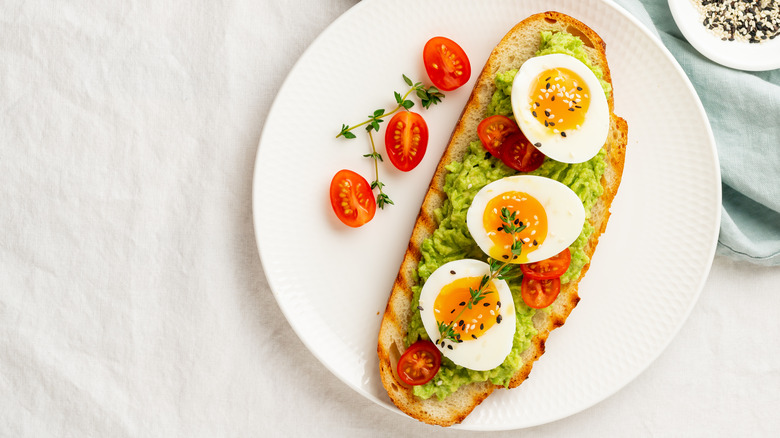 soft boiled eggs on avocado toast 