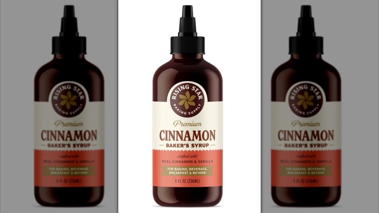 Bottle of Rising Star Premium Cinnamon Baker's Syrup on a white background.