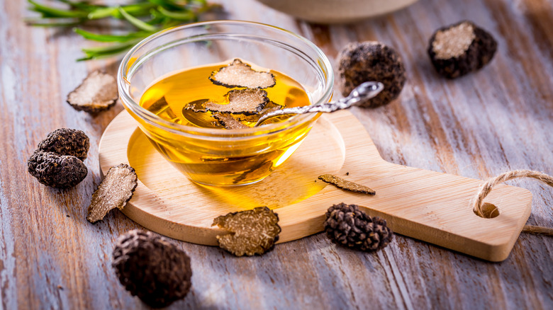 Ramekin of oil and black truffles