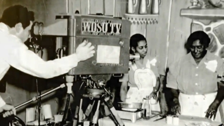 Lena Richard in 1949 or 50, cooking in front of a WDSU TV camera with another black woman standing to her right