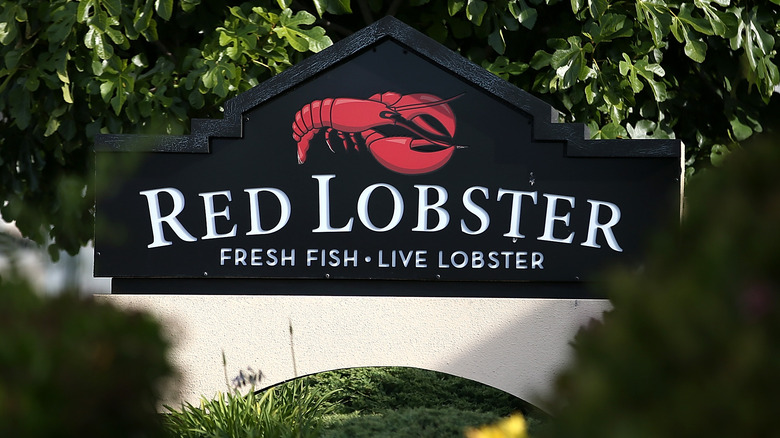 Red Lobster sign in foliage 