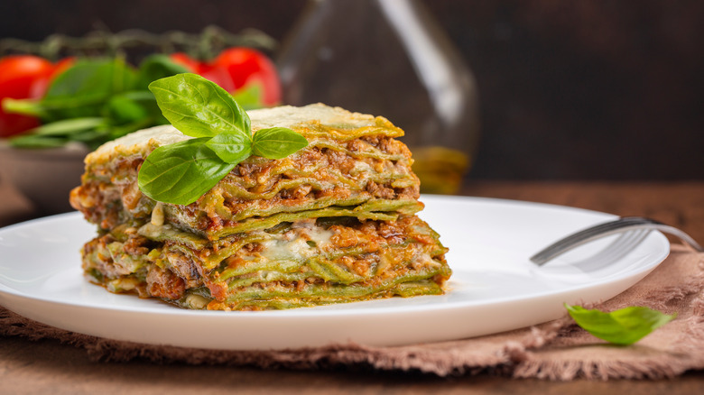 Green lasagne on plate