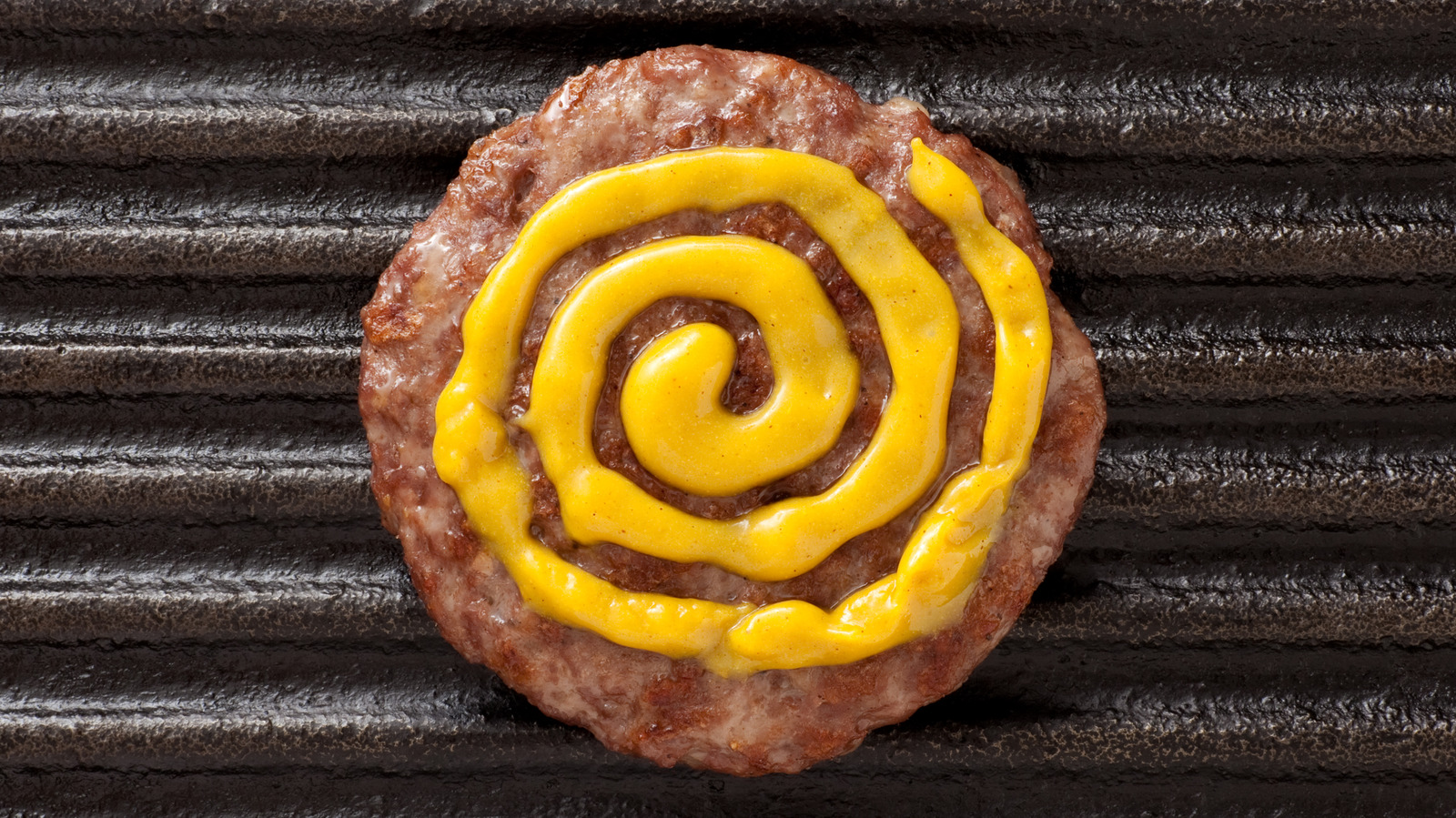 Grill Your Burger Patties With Some Mustard For Tangy Perfection