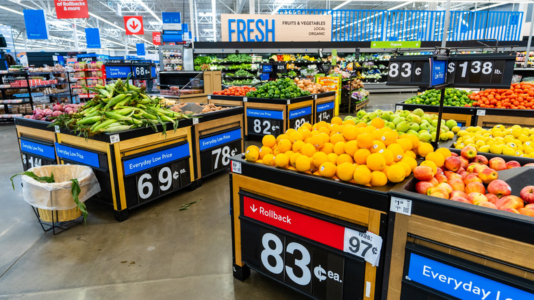 Produce section at a Walmart with assorted fresh fruits and vegetables