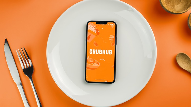Grubhub logo on plated smartphone