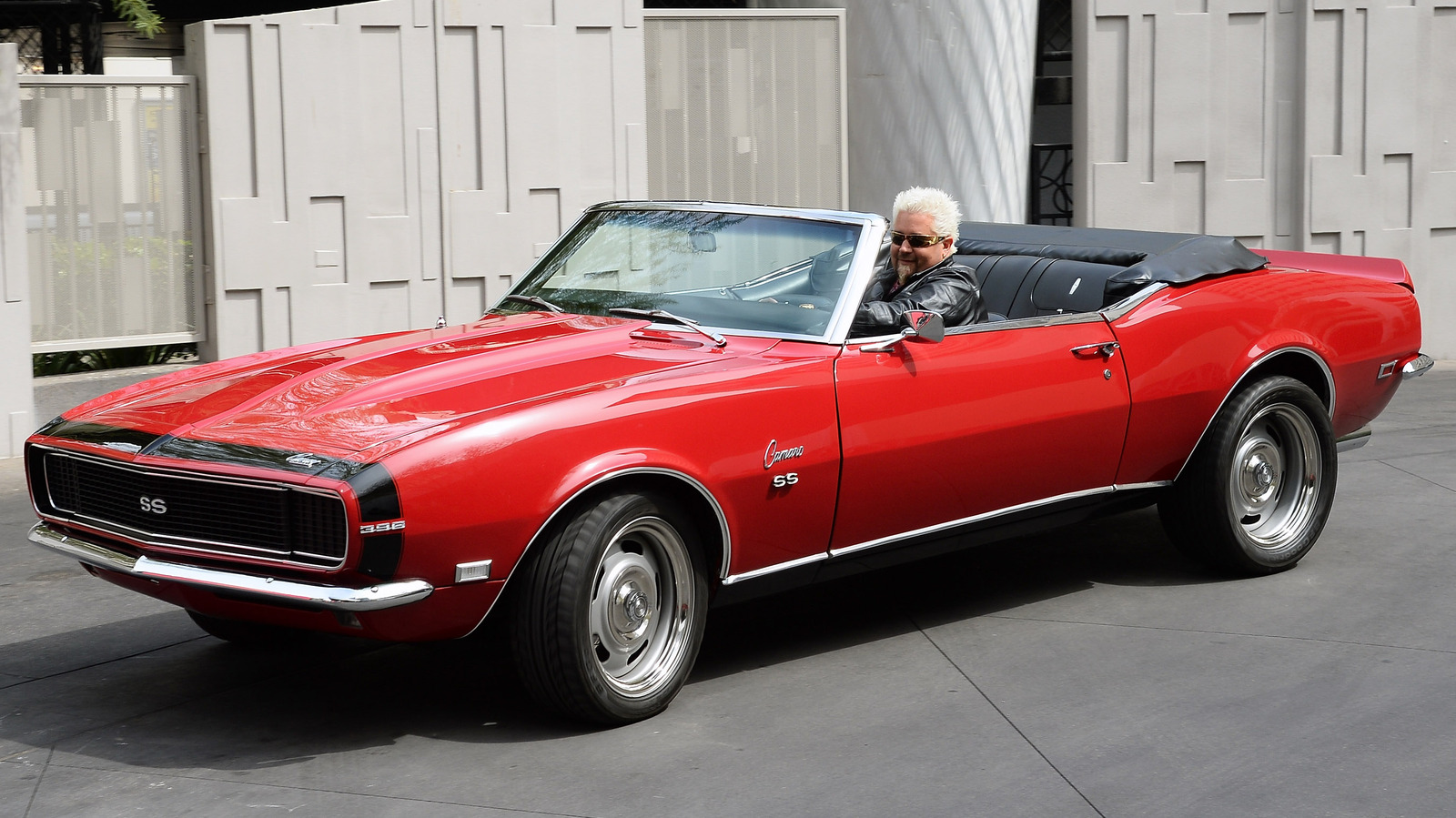 Guy Fieri Doesn't Really Drive The Red Camaro To Every Diners, DriveIns, And Dives Stop