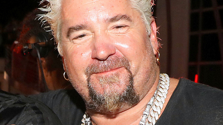 Guy Fieri with slight smile
