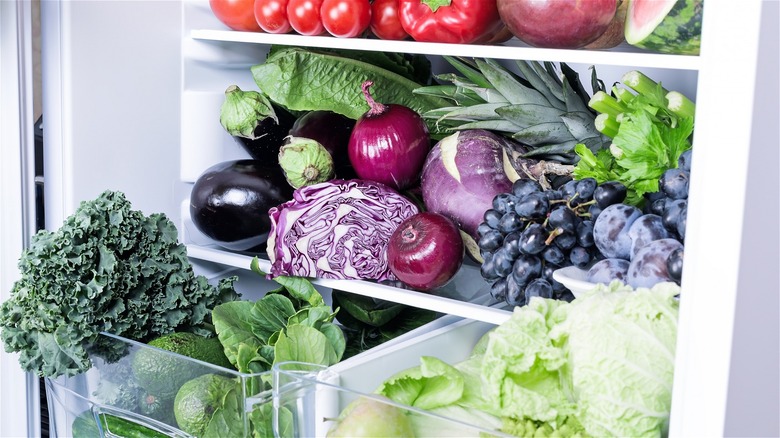 fridge full of different vegetables 