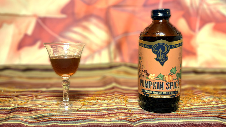 Portland Syrups pumpkin spice concentrate in glass next to bottle