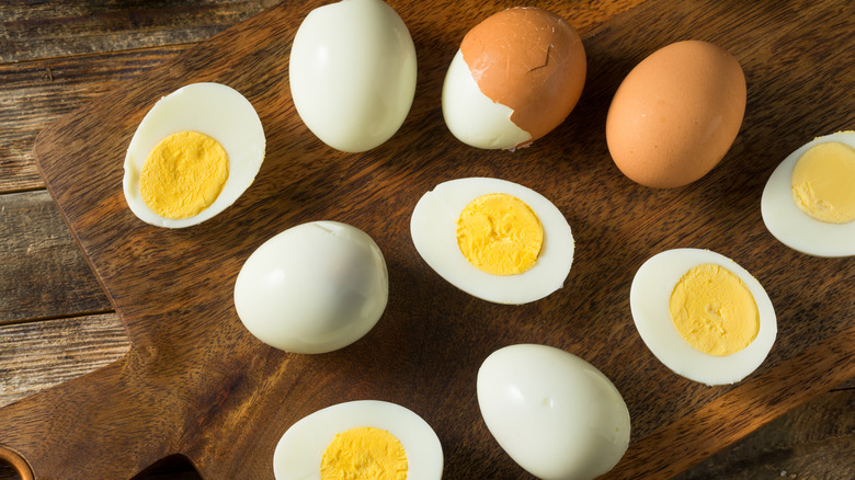 Cutting board with halved hardboiled eggs