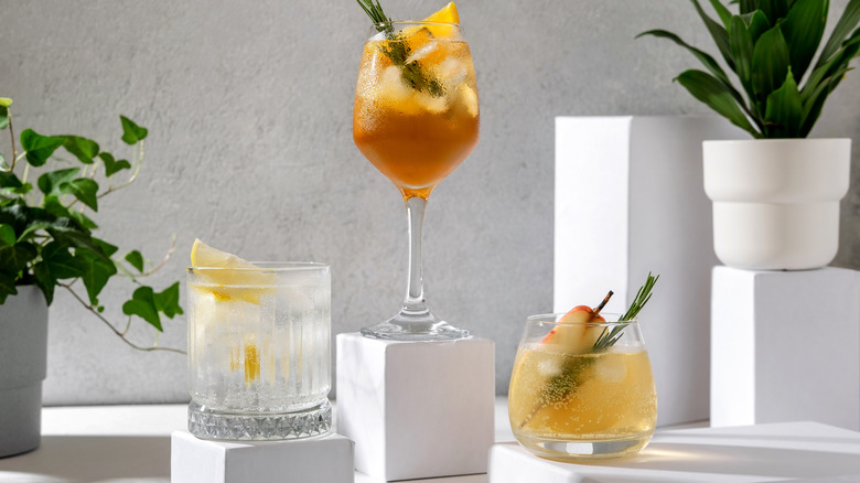 cocktails on white podiums