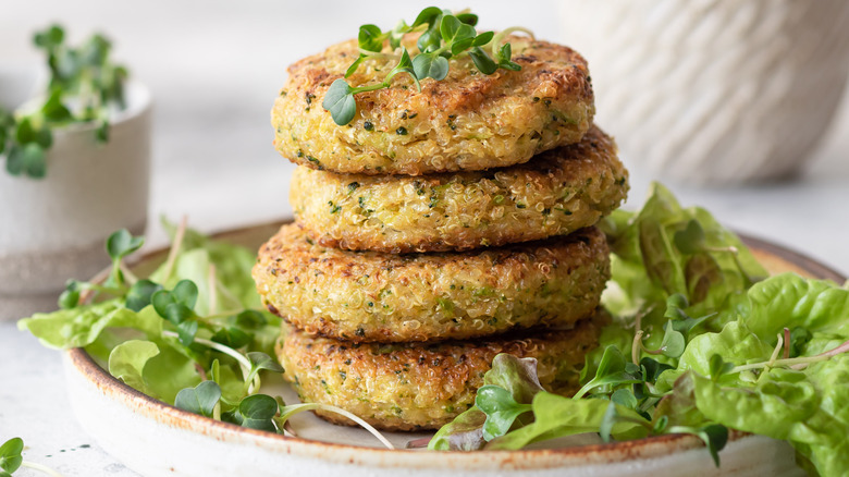 quinoa patties stacked on platter