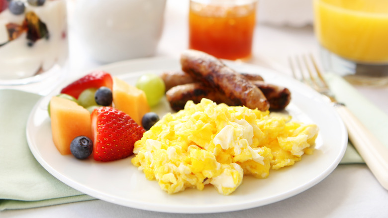 Scrambled eggs on breakfast plate