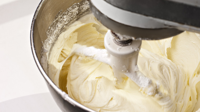 mixing cream cheese frosting