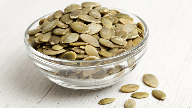 Bowl of raw pumpkin seeds