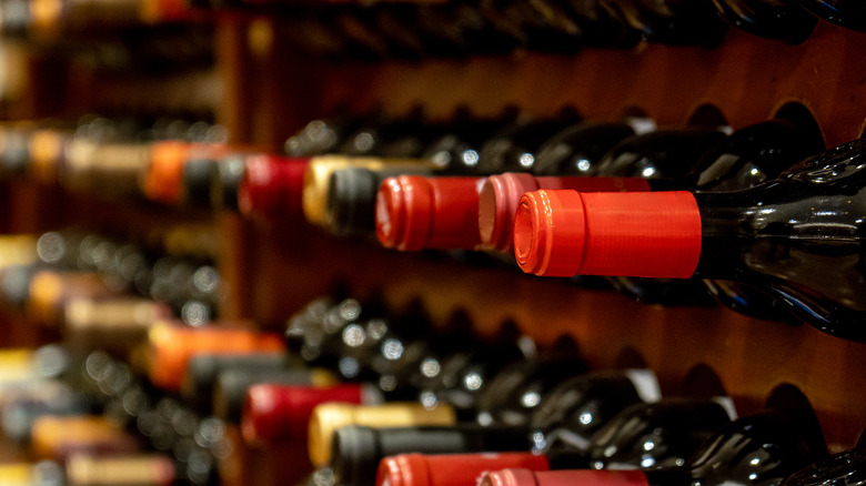 Rows of red wine bottles