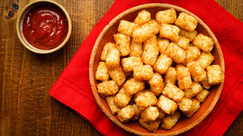 Tater tots served with ketchup