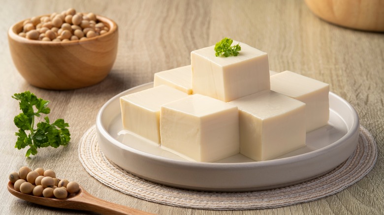 Tofu blocks on white plate