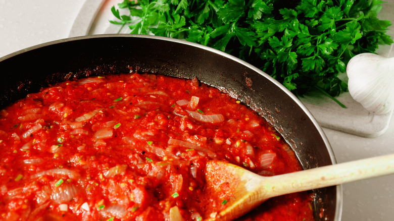 marinara sauce simmering in pan