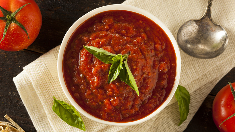 Marinara sauce inside white bowl