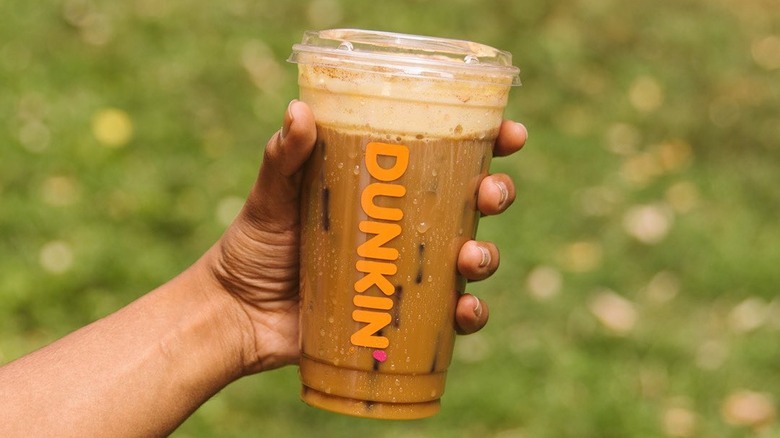 Person holding Dunkin Cold Brew