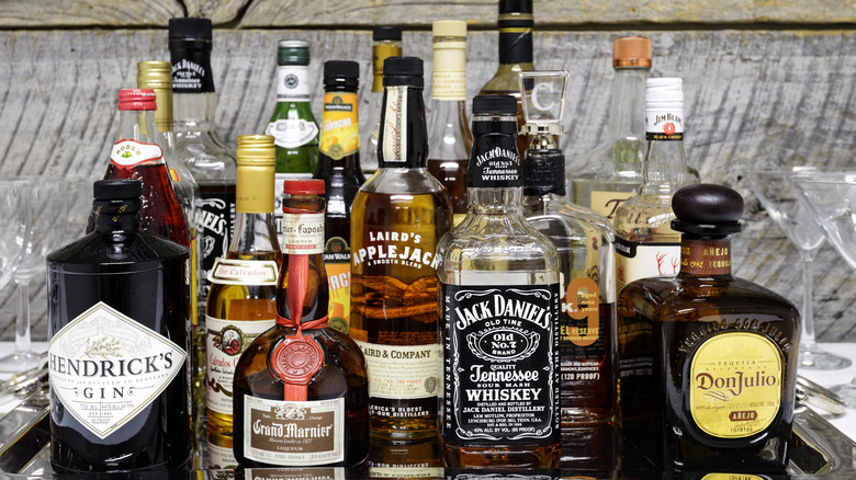 Variety of liquor bottles in home bar