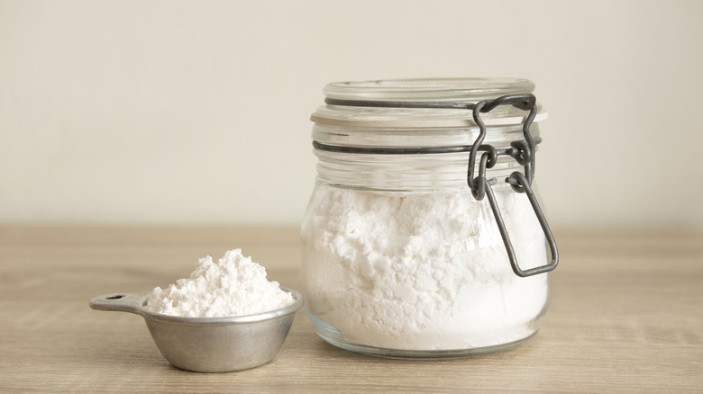 Flour in measuring jar