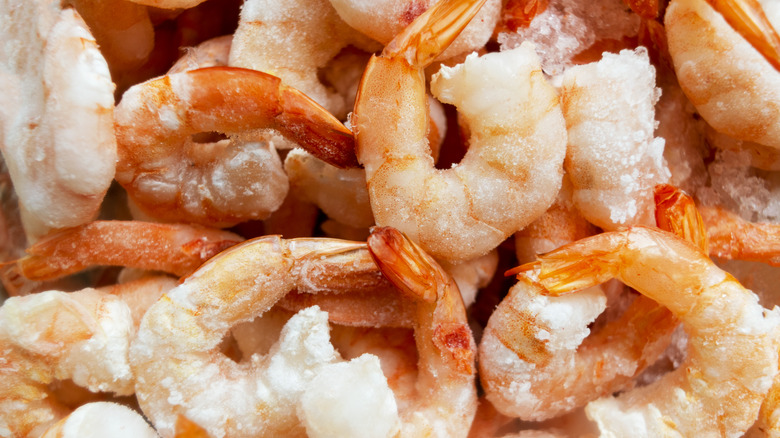 Pile of frozen cooked shrimp
