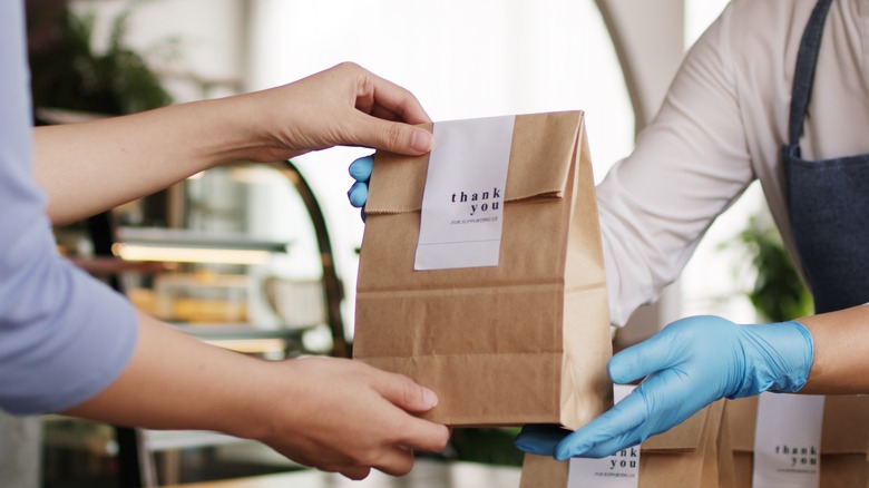 delivery food getting handed off