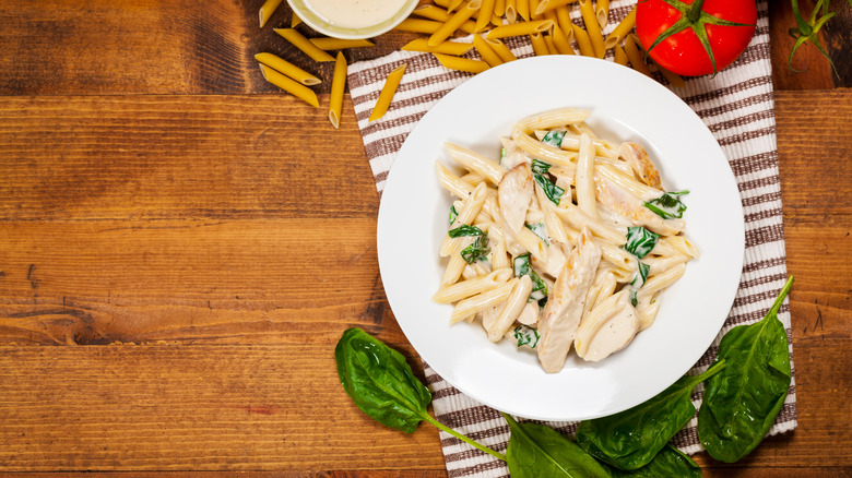 A bowl of chicken Alfredo