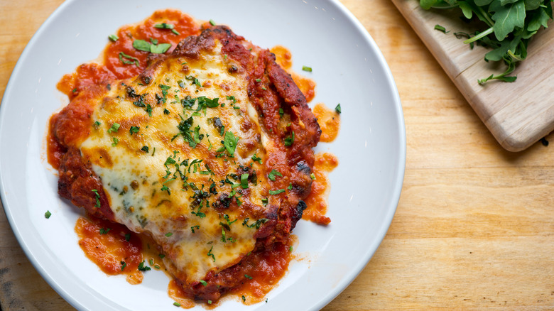 A plate of chicken parmigiana