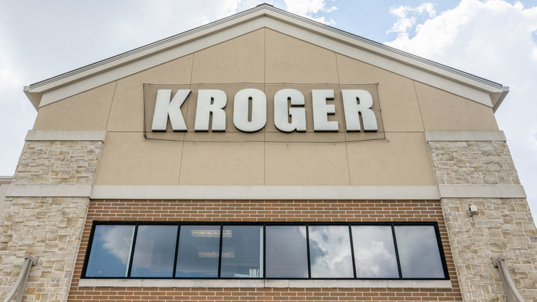 Front of a beige Kroger store