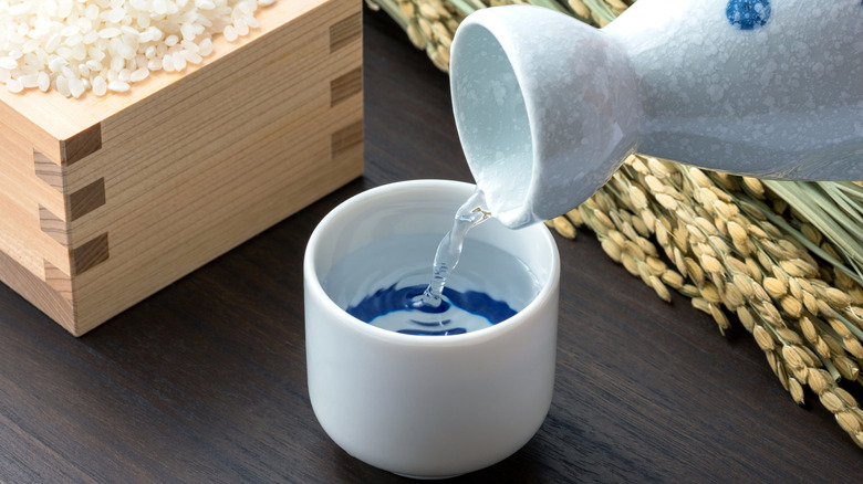 Sake being poured into a glass