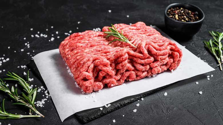 ground beef on a black background