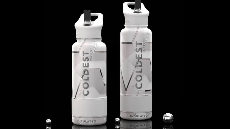two white coldest water bottles on a black background