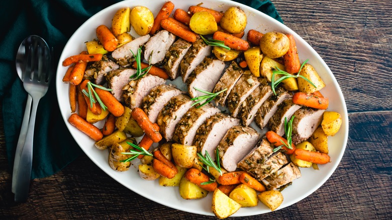 Pork tenderloin with roast vegetables platter