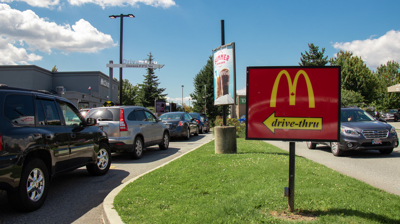 McDonald's drive-thru with cars