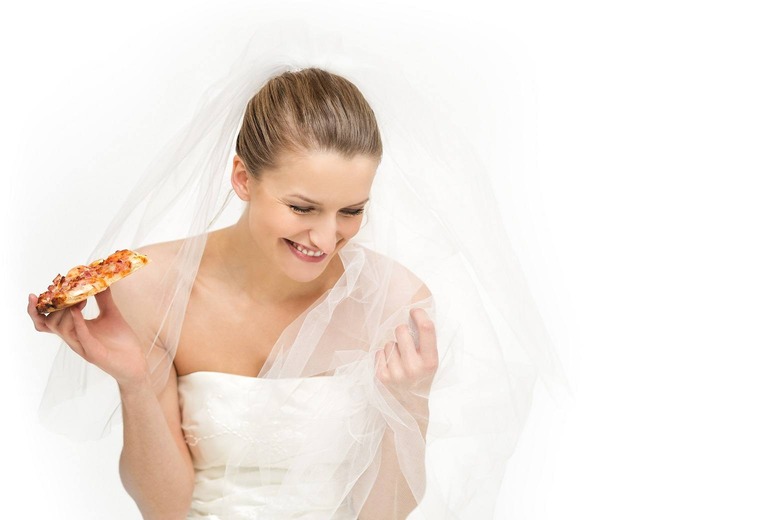 bride eating pizza