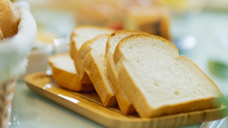 Slices of white bread on a tray