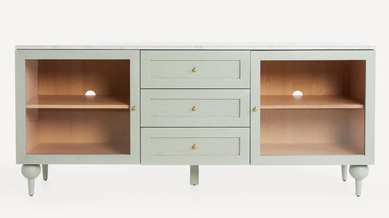 The Fern buffet table from Anthropologie in a light sage green color