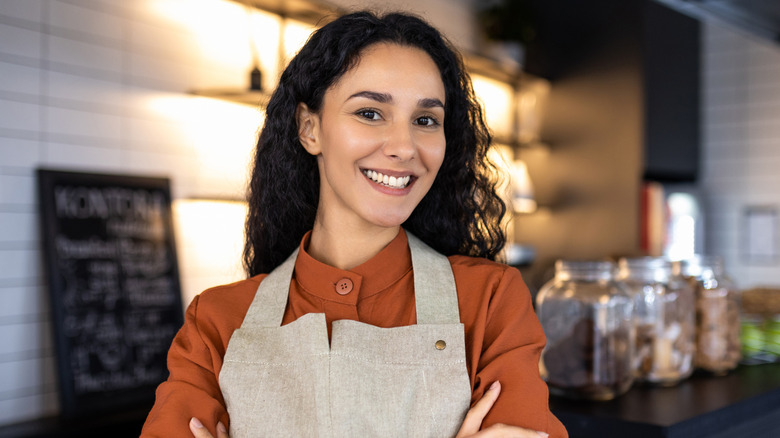 Female Restaurant Manager smiling
