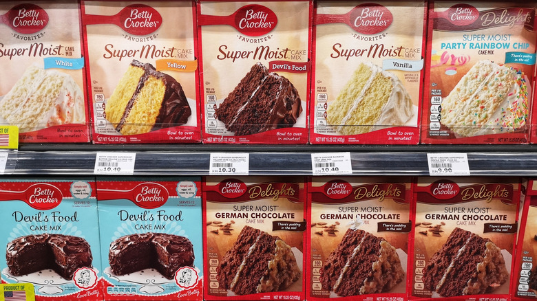 Boxed cake mixes on shelves