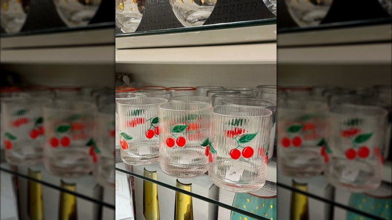 Glass cups with cherry pattern on HomeGoods shelf