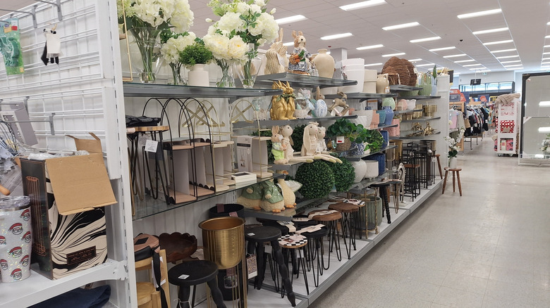 Homesense shelves filled with faux florals and indoor garden-related items